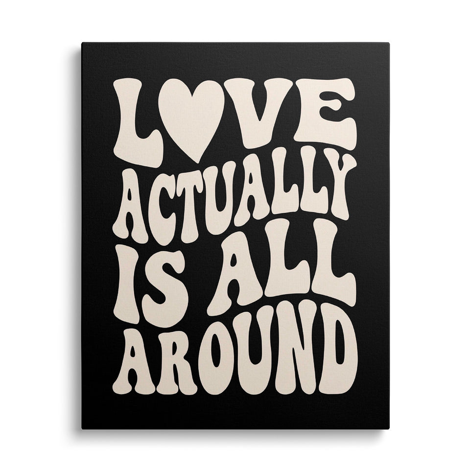 Toile All Around vue de face sur fond blanc : lettrage crème « Love actually is all around » sur fond noir