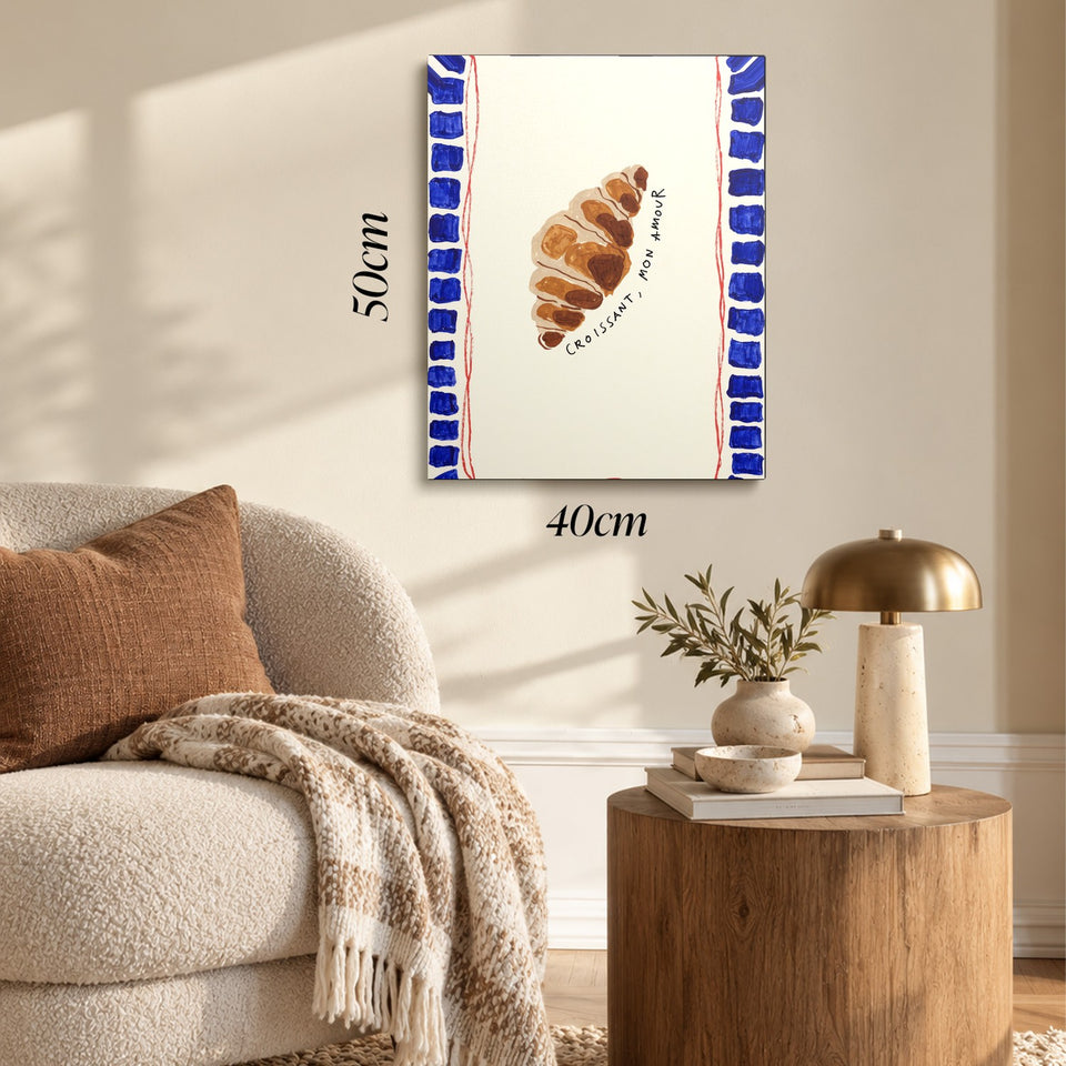 Toile Croissant Mon Amour accrochée dans un salon au-dessus d’un canapé, avec ses cotes 40 × 50 cm