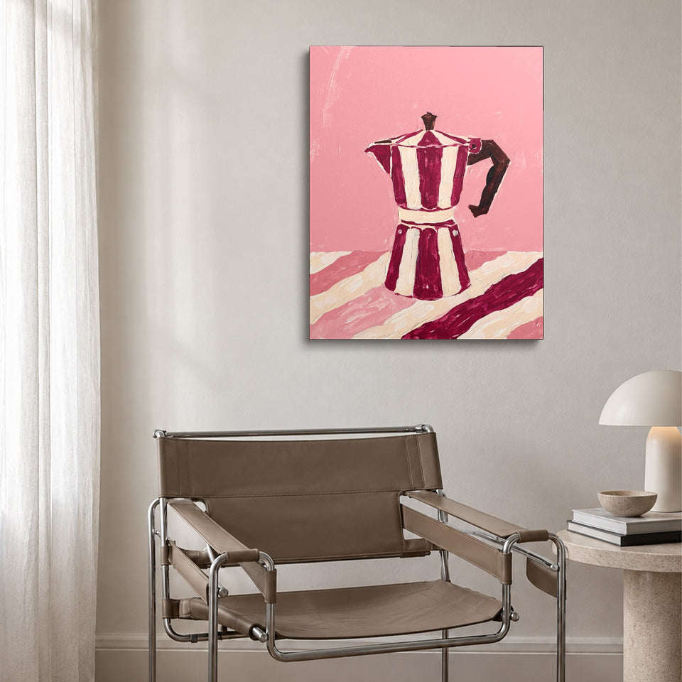 Toile La Moka accrochée au-dessus d’un fauteuil en cuir et acier